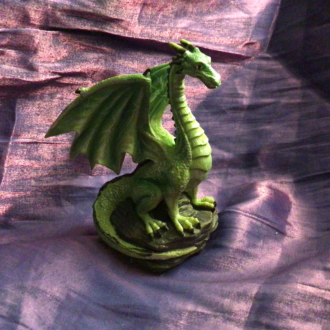 Green Dragon Perched on a Rock